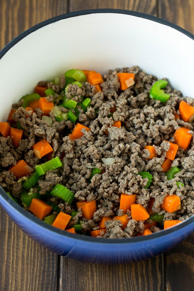 Alphabet Soup Recipe | Hamburger Soup | Beef and Vegetable Soup #soup #hamburger #noodles #dinner #edsug #carrots Ground beef, carrots, onion and celery in a soup pot.