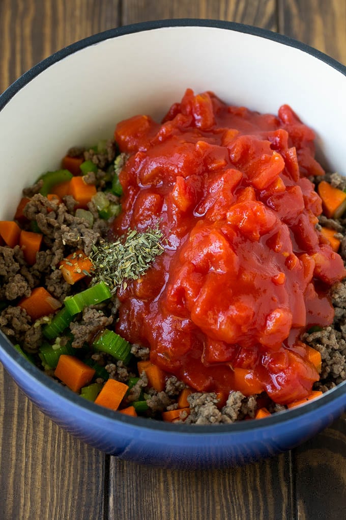 Alphabet Soup Recipe | Hamburger Soup | Beef and Vegetable Soup #soup #hamburger #noodles #dinner #edsug #carrots Ground beef, vegetables, canned tomatoes and seasonings in a pot.