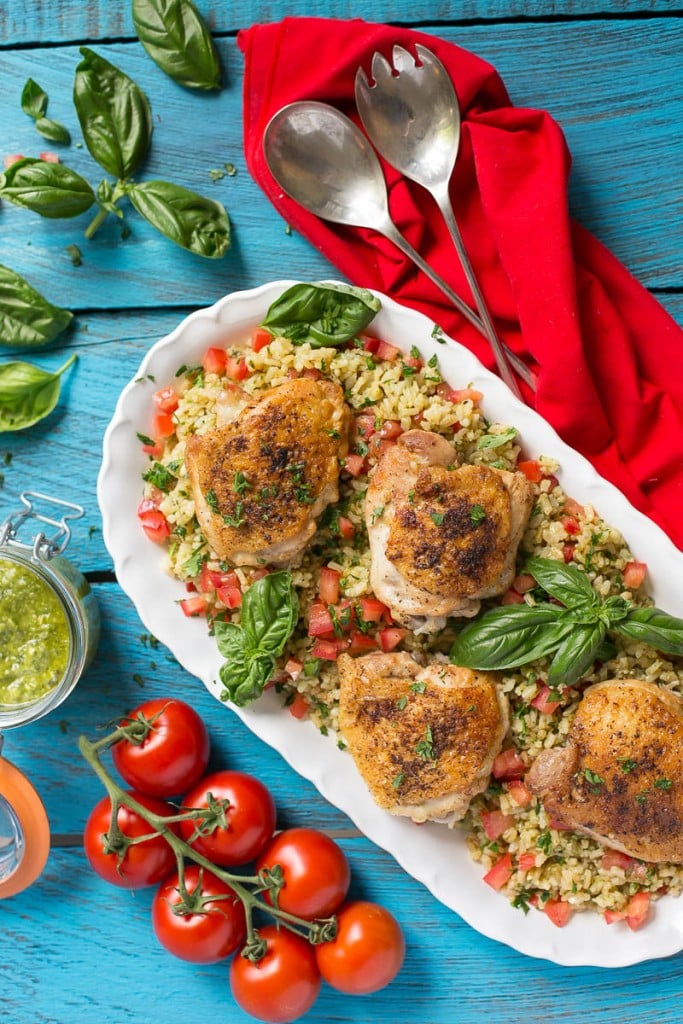 This one pot chicken with tomato basil risotto is the perfect weeknight meal - the whole thing bakes in the oven in a single dish!
