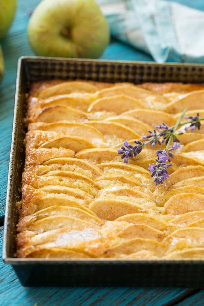 A sweet dessert with fresh apples baked into the top.