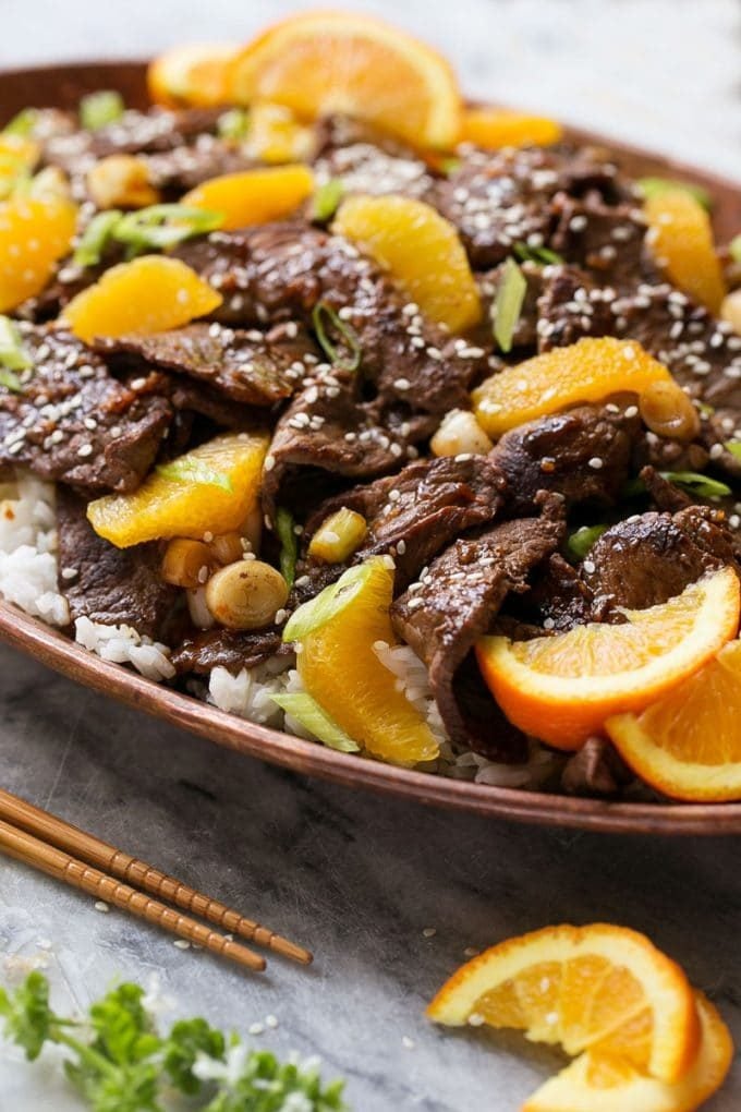 Orange Beef Stir Fry Recipe | 4 Ingredient Orange Beef | Easy Orange Beef #orange #beef #stirfry #asian #dinner #edsug A platter of beef in orange sauce.