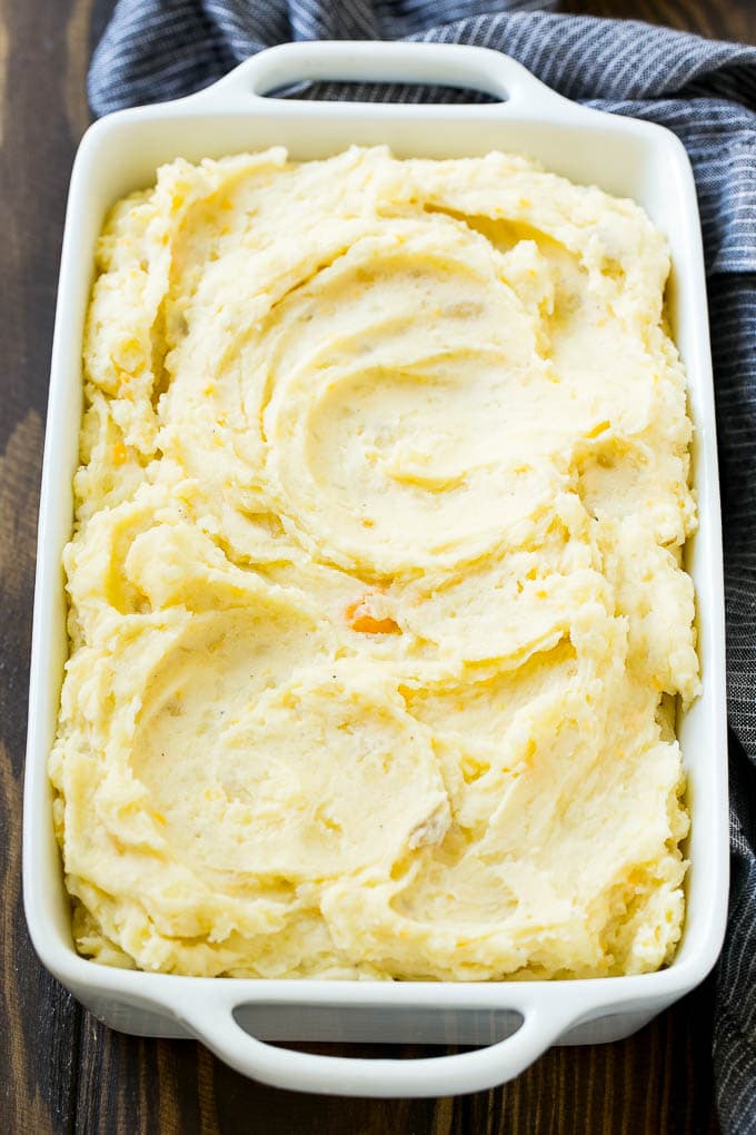 Loaded Mashed Potato Casserole Recipe | Loaded Potatoes | Bacon Mashed Potatoes | Thanksgiving Mashed Potatoes #potatoes #bacon #cheese #casserole #Thanksgiving #dinner #edsug Mashed potatoes in a baking dish.