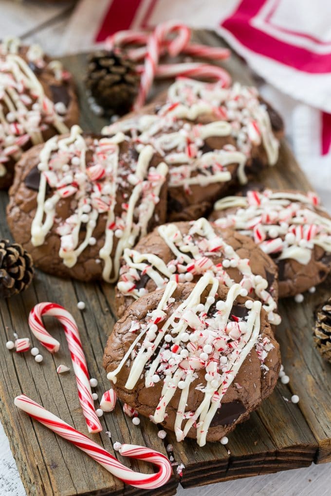 Peppermint Bark Cookie | Easy Peppermint Bark Cookies | Christmas Cookies | Peppermint Bark Cookies | Chocolate Peppermint Cookie #peppermint #peppermintbark #cookies #christmas #holiday #dessert #edsug Peppermint Bark Cookies drizzled with white chocolate.