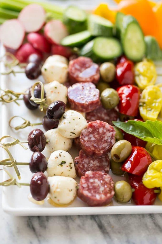 Antipasto Skewers Recipe | Easy Antipasto | Best Antipasto #antipasto #skewers #appetizer #edsug Antipasto skewers on a white serving platter.