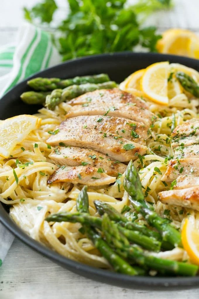 Lemon Asparagus Pasta with Grilled Chicken Recipe | Asparagus Pasta | Grilled Chicken Pasta | Easy Pasta Recipe #pasta #asparagus #lemon #chicken #dinner #edsug A skillet with lemon asparagus pasta, cream sauce and sliced grilled chicken.