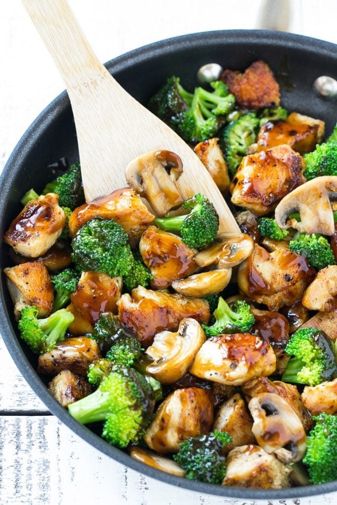 Chicken and Broccoli Stir Fry Recipe | Chicken Stir Fry | Healthy Chicken Recipe | Chicken and Broccoli | Chinese Food #chicken #broccoli #stirfry #healthy #cleaneating #dinner #edsug Chicken and broccoli stir fry with mushrooms in a skillet with a spatula.