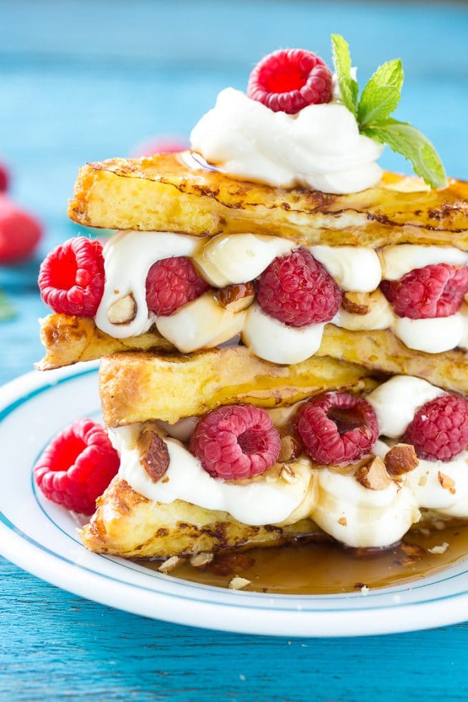 Stuffed French Toast | Cream Cheese Stuffed French Toast | French Toast Recipe #frenchtoast #raspberry #creamcheese #breakfast #brunch #edsug Stuffed french toast filled with cream cheese and raspberries.