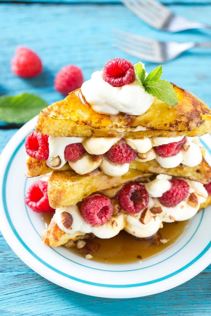 Stuffed French Toast | Cream Cheese Stuffed French Toast | French Toast Recipe #frenchtoast #raspberry #creamcheese #breakfast #brunch #edsug Stuffed french toast with a cream cheese, berry and almond filling.