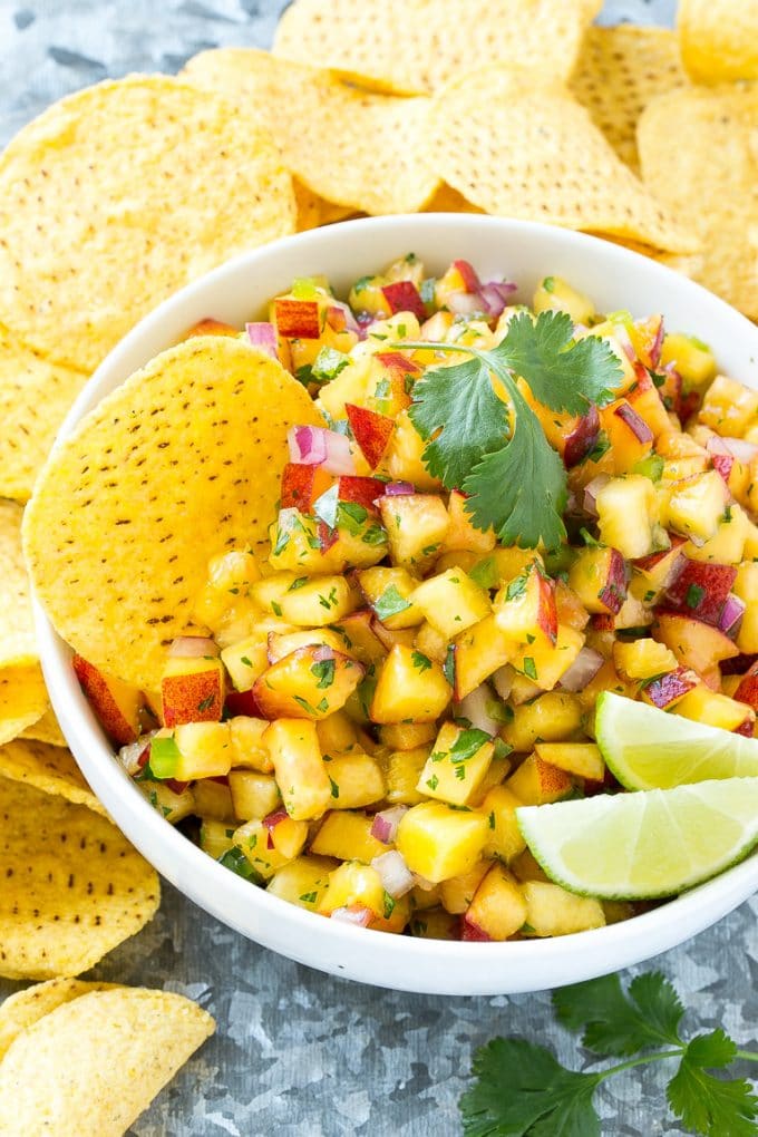 Peach Salsa | Fruit Salsa #peaches #salsa #dip #appetizer #edsug Peach salsa served with corn tortilla chips.