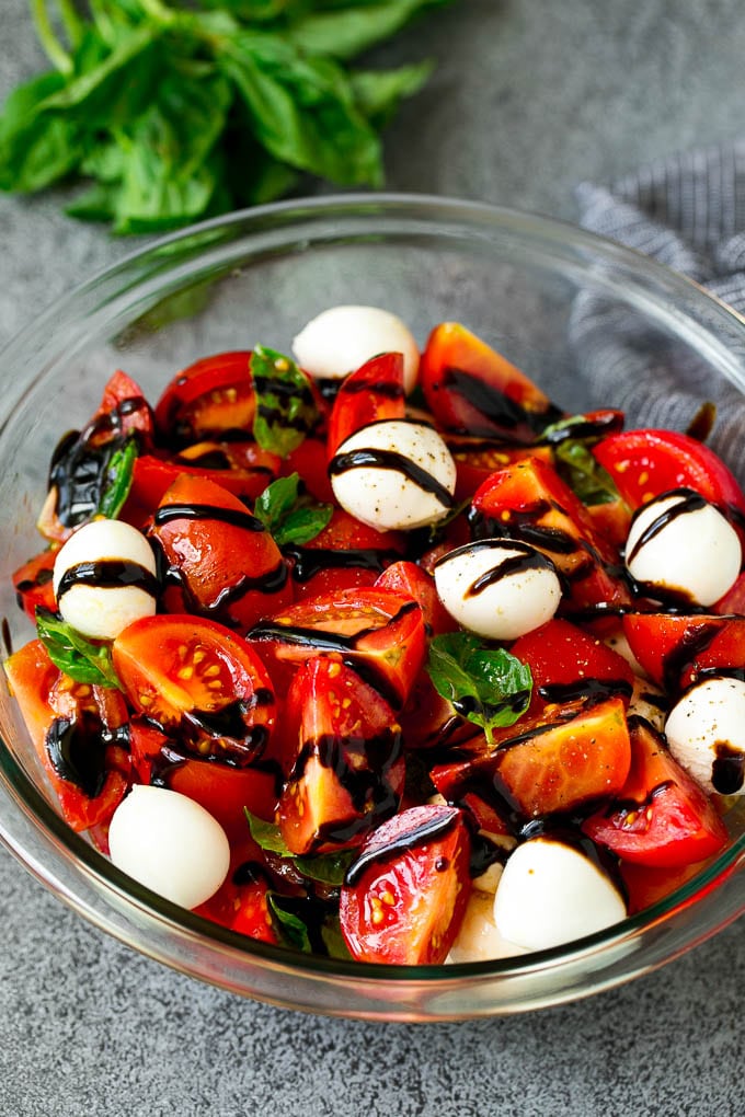 Caprese Salad Recipe | Tomato Salad #salad #tomato #mozzarella #cheese #basil #caprese #summer #edsug Caprese salad with tomatoes, fresh mozzarella, basil leaves and balsamic glaze.