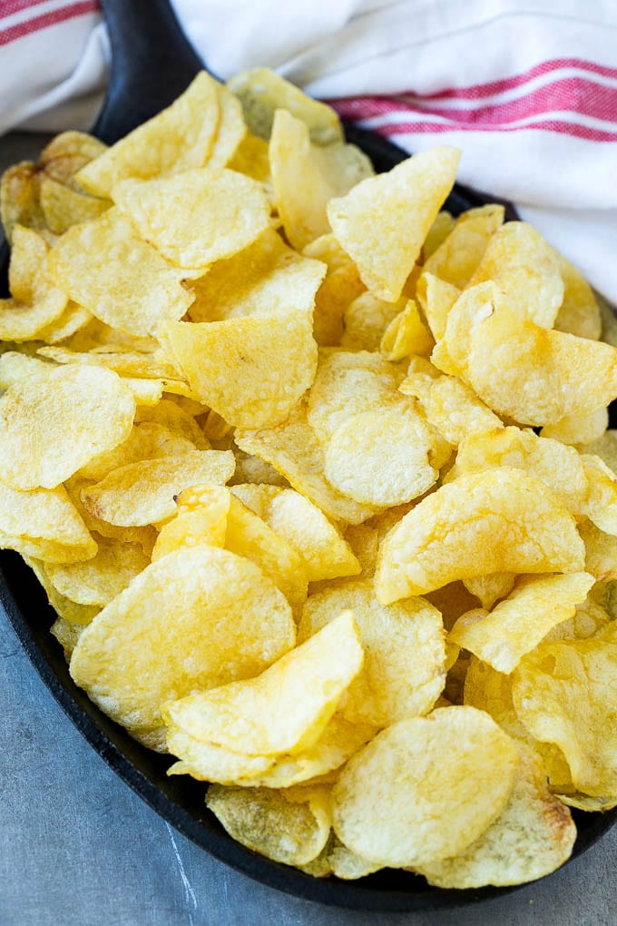 Irish Nachos Recipe | Potato Nachos | Potato Chip Recipe | Appetizer Recipe #nachos #potatoes #cheese #bacon #appetizer #edsug Kettle chips in a skillet.