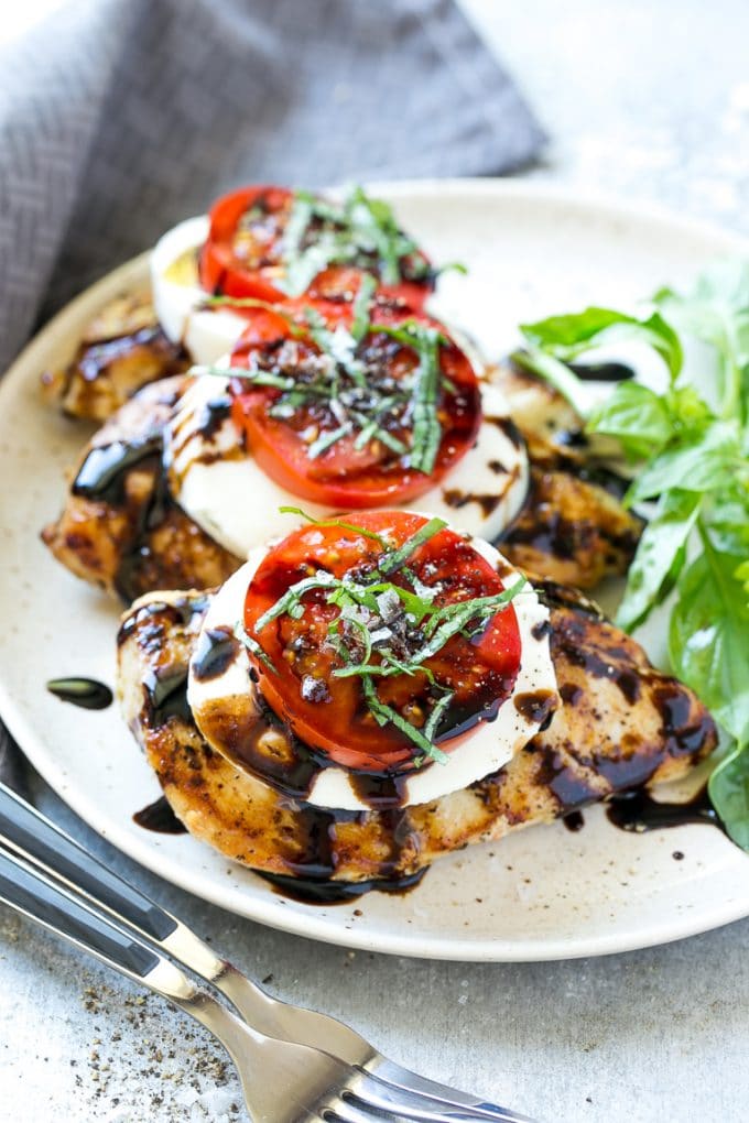 Chicken Caprese Recipe | Grilled Chicken #chicken #caprese #grilling #dinner #tomato #basil #edsug Grilled chicken breasts topped with mozzarella cheese, tomatoes and basil.