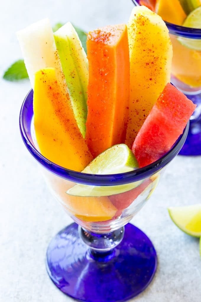 Mexican Fruit Cups | Fruit Cups | Mexican Fruit | Tropical Fruit #fruit #fruitcup #watermelon #pineapple #snack #healthy #edsug Fruit cups filled with watermelon, cucumber, papaya and mango.