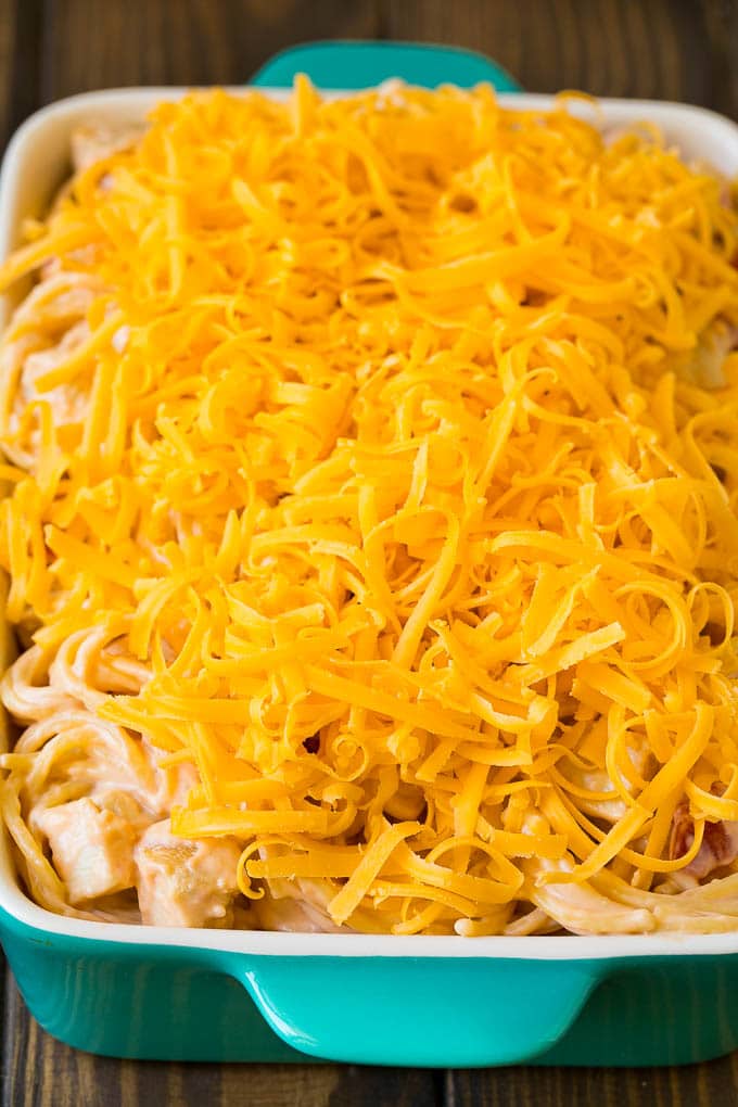 Chicken Spaghetti Recipe | Baked Spaghetti #pasta #spaghetti #chicken #cheese #casserole #dinner #edsug A baking dish of creamy spaghetti topped with cheese.