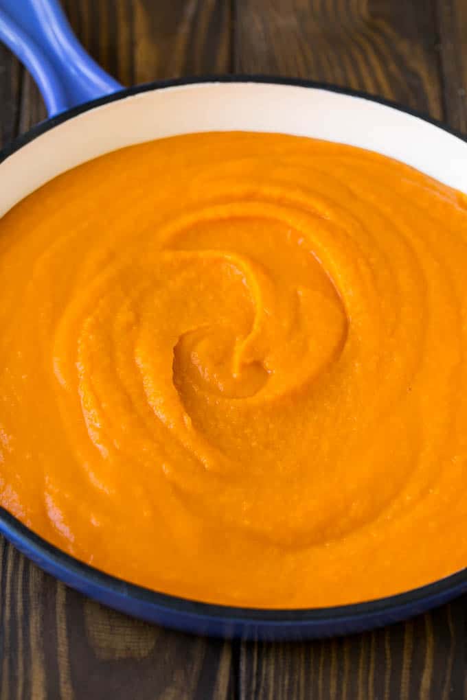 Butternut Squash Pasta Recipe #pasta #squash #bacon #fall #dinner #edsug Creamy butternut squash sauce in a pan.