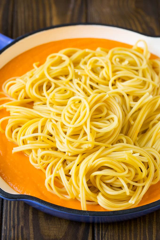 Butternut Squash Pasta Recipe #pasta #squash #bacon #fall #dinner #edsug Spaghetti in a pool of butternut squash sauce.