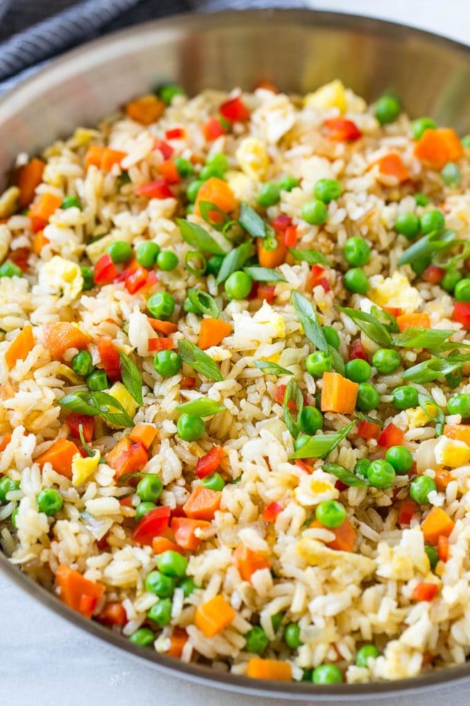 Veggie Fried Rice Recipe | Vegetarian Fried Rice | Easy Fried Rice Recipe | Chinese Food #rice #friedrice #veggie #vegetarian #sidedish #edsug A skillet of vegetarian fried rice with eggs, peas, carrots and peppers.