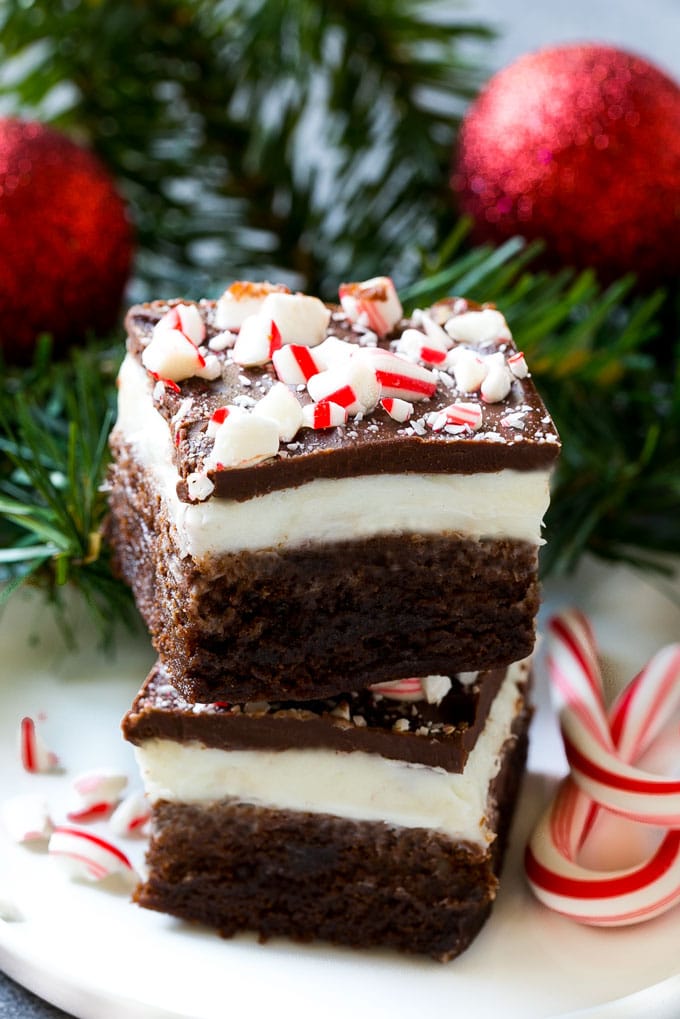 Peppermint Brownies Recipe | Holiday Brownies | Candy Cane Brownies | Mint Brownies #brownies #mint #peppermint #chocolate #dessert #christmas #edsug These layered treats on a plate are simple to make yet look so impressive.