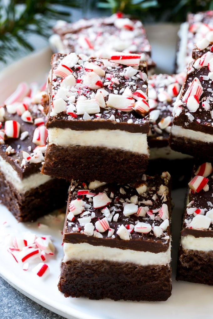 Peppermint Brownies Recipe | Holiday Brownies | Candy Cane Brownies | Mint Brownies #brownies #mint #peppermint #chocolate #dessert #christmas #edsug These layered peppermint brownies are full of flavor and so festive for the holidays with crushed candy canes on top.