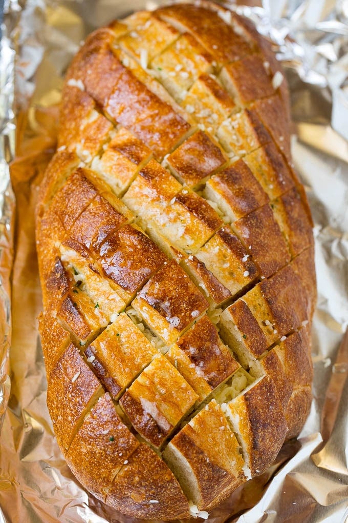 Pull Apart Bread | Garlic Bread | Cheese Bread #bread #garlic #cheese #sidedish #appetizer #edsug Garlic butter and shredded cheese stuffed into a cut loaf of bread.