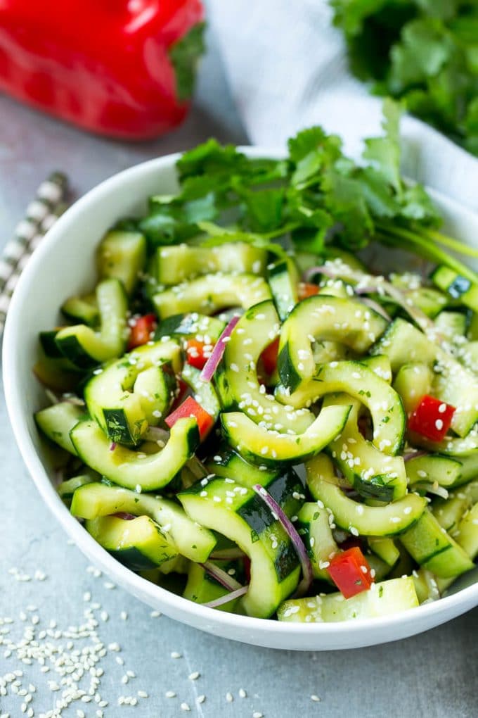 Asian Cucumber Salad Recipe | Sesame Cucumber Salad | Cucumber Salad | Healthy Salad | Healthy Cucumber Recipe #cucumber #cucumbersalad #salad #sidedish #edsug This recipe for Asian cucumber salad is cucumbers and colorful veggies tossed in a zesty sesame dressing. The perfect quick and easy side dish!