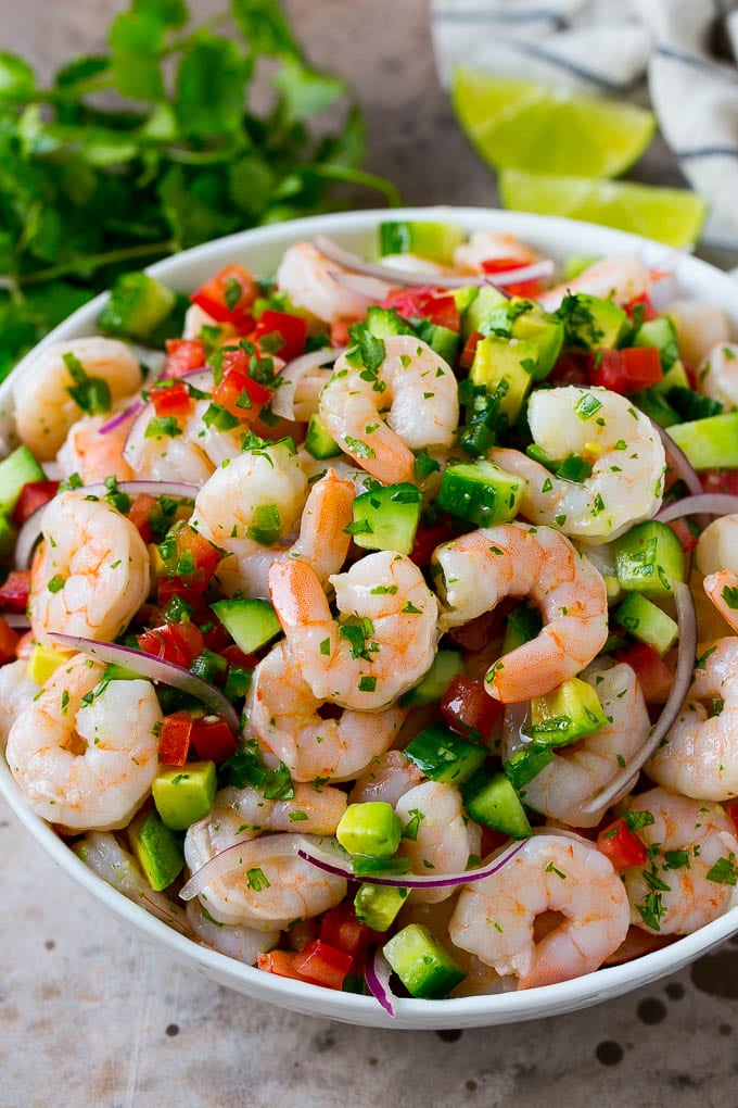 Shrimp Ceviche Recipe | Mexican Shrimp | Marinated Shrimp #shrimp #ceviche #cleaneating #healthy #lowcarb #keto #glutenfree #dinner #appetizer #edsug A bowl of shrimp ceviche marinated in citrus juice with tomato, avocado, cilantro and jalapeno.