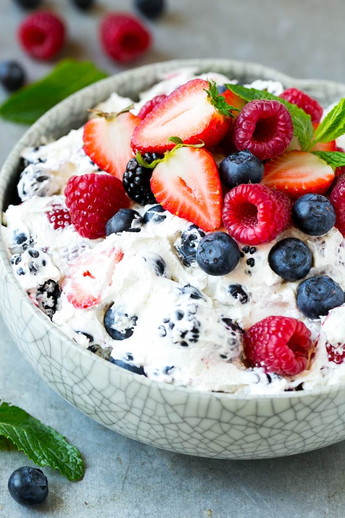 Berry Cheesecake Salad Recipe | Fruit Salad | Berry Fruit Salad | Cheesecake Salad #salad #cheesecake #fruit #berries #sidedish #dessert #edsug A serving bowl of creamy berry salad topped with blueberries, raspberries and strawberries.