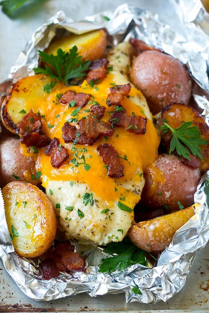Bacon Ranch Chicken Foil Packets | Chicken in Foil | Foil Packet Recipe | Ranch Chicken #ranchchicken #grilling #chicken #foilpacket #foilpackets #bacon #dinner #edsug A bacon ranch chicken foil packet with potatoes.