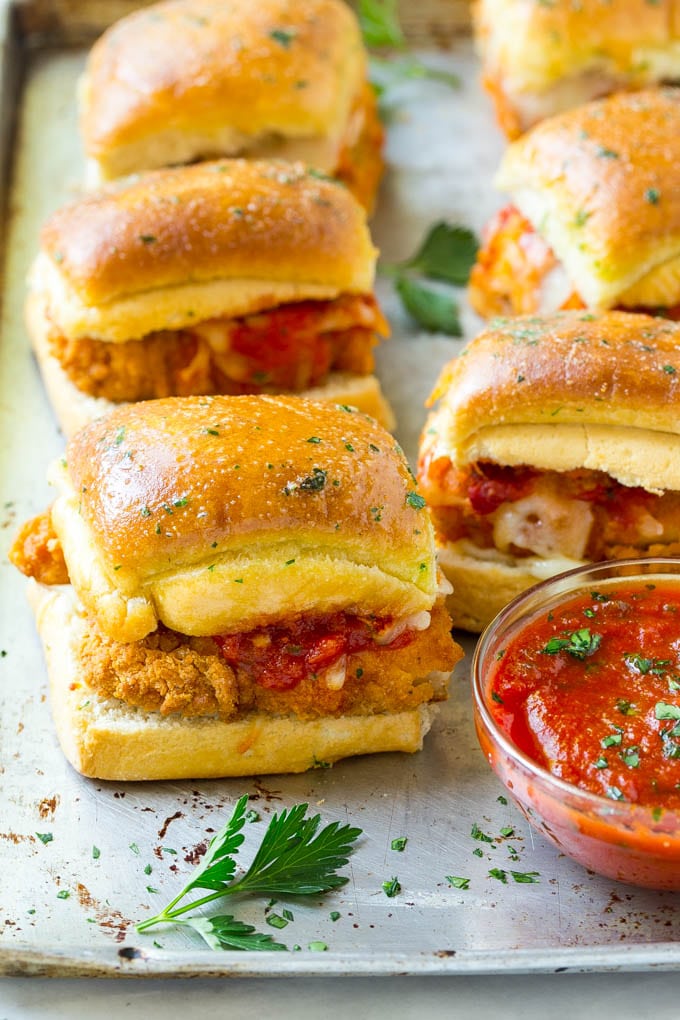 Chicken Parmesan Sliders | Chicken Parmesan Sandwich Recipe | Slider Sandwich Recipe #sliders #chickenparm #chickenparmesan #chickenparmesansliders #dinner #appetizer #edsug Chicken parmesan sliders made with crispy chicken, marinara sauce and cheese on buns.