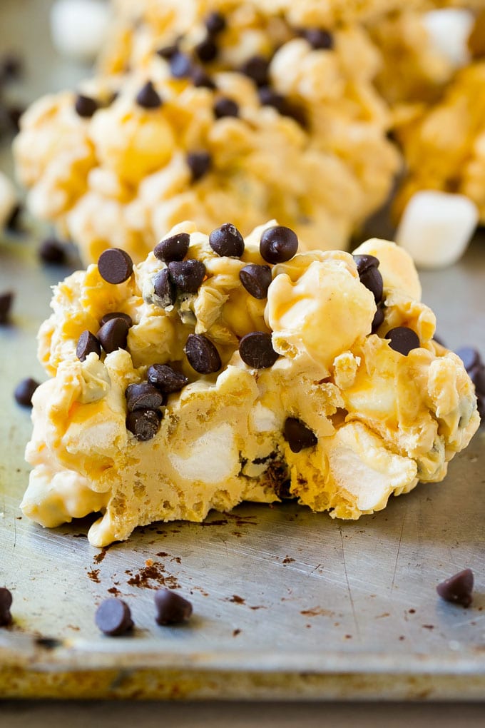 Avalanche Cookies Recipe | No Bake Cookie Recipe | Easy Cookie Recipe | Avalanche Bark #bark #avalanche #avalanchecookies #cookies #nobakecookies #nobake #dessert #edsug A close up of an avalanche cookie with a bite taken out of it.