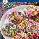 These funfetti cookies are soft cake mix cookies that are rolled in sprinkles and baked to golden brown perfection.