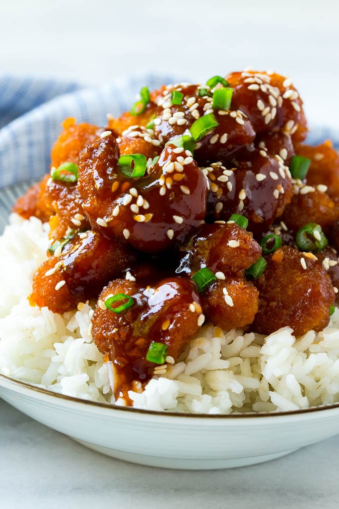 Sesame Shrimp Recipe | Crispy Shrimp | Popcorn Shrimp | Asian Shrimp | Easy Shrimp Recipe #shrimp #fried #friedshrimp #sesameshrimp #crispy #popcornshrimp #chinese #asian #dinner #edsug A bowl of Asian style crispy sesame shrimp over rice.