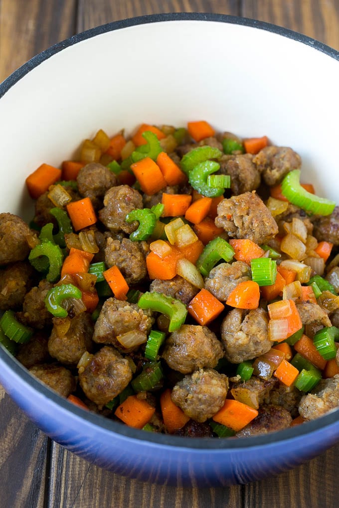 Tortellini Soup Recipe | Sausage Soup | Italian Soup #soup #sausage #pasta #tortellini #dinner #edsug Sausage, carrots, onion and celery in a pot.