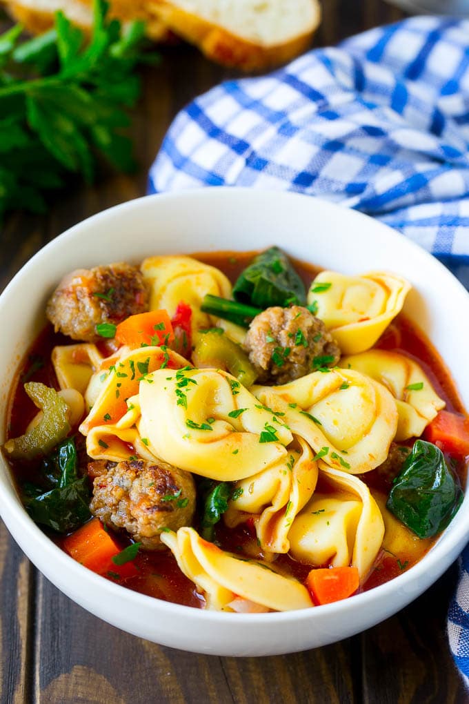 Tortellini Soup Recipe | Sausage Soup | Italian Soup #soup #sausage #pasta #tortellini #dinner #edsug A bowl of tortellini soup with sausage and vegetables.
