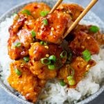 A bowl of sweet and spicy firecracker chicken.