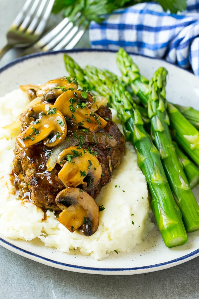 Slow Cooker Salisbury Steak Recipe | Homemade Salisbury Steak | Salisbury Steak from Scratch #steak #beef #salisbury #salisburysteak #slowcooker #crockpot #dinner #edsug Slow cooker salisbury steak with mushroom gravy over mashed potatoes.