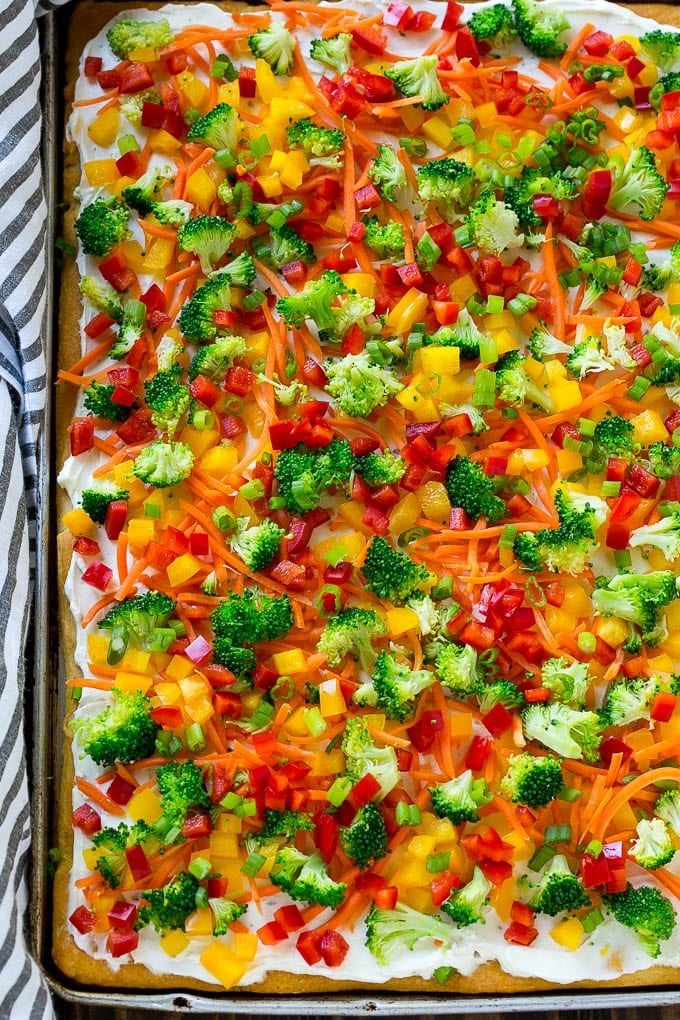 Veggie Pizza Recipe | Crescent Veggie Pizza | Vegetable Pizza Recipe | Holiday Appetizer | Homemade Veggie Pizza #pizza #veggies #vegetarian #appetizer #edsug A sheet pan of crescent veggie pizza.