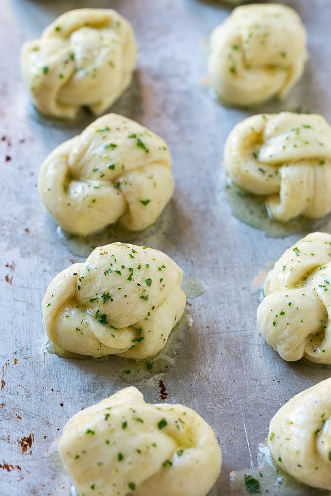 Garlic Knots Recipe | Garlic Rolls | Garlic Butter Rolls | Garlic Bread Recipe #garlic #garlicbread #garlicknots #breadsticks #edsug Dough brushed with butter, herbs and parmesan for extra flavor.