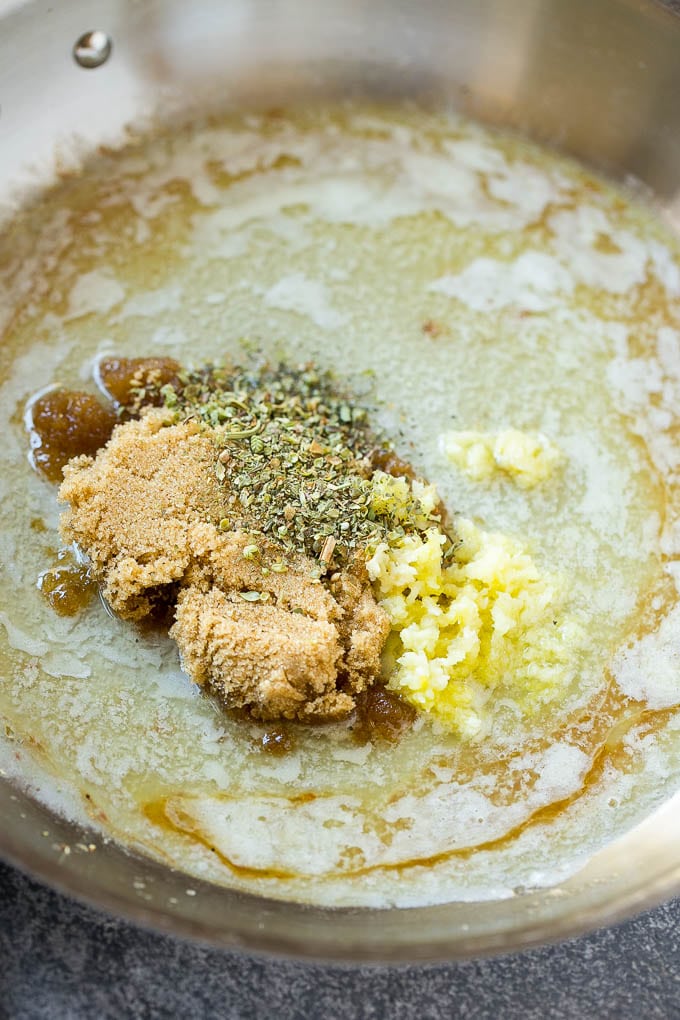 Brown Sugar Pork Chops Recipe | Bone In Pork Chops Recipe | Garlic Butter Pork Chops | Skillet Pork Chops #pork #porkchops #garlic #dinner #glutenfree #edsug Melted butter, brown sugar, herbs and garlic form the sauce for pork chops.