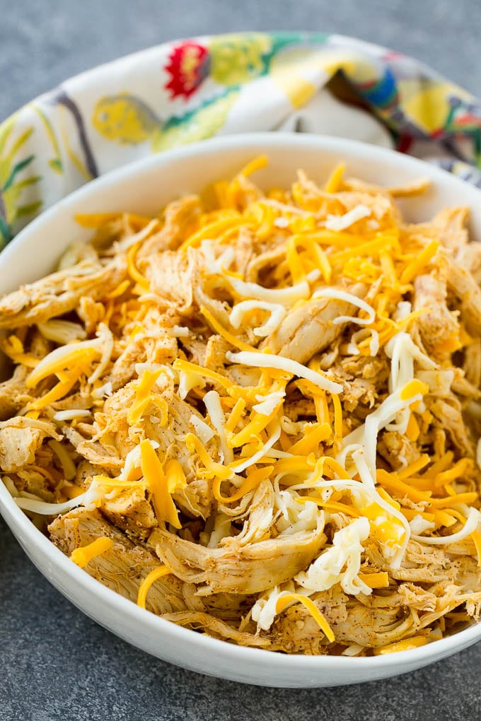 Chicken Taquitos Recipe | Baked Chicken Taquitos | Fried Chicken Taquitos | Mexican Appetizer | Chicken Tortillas #taquitos #chicken #appetizer #tortillas #mexicanfood #edsug A bowl of chicken taquito filling.