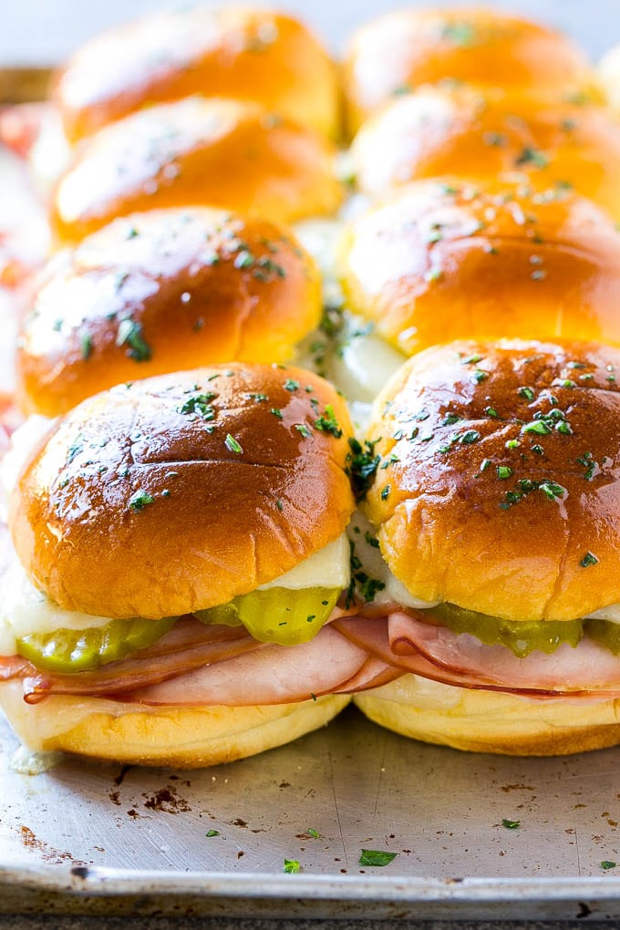 Cuban Sliders Recipe | Cuban Sandwich Recipe | Slider Sandwiches | Ham and Cheese Sliders #sliders #sandwiches #ham #cheese #appetizer #edsug A sheet pan of Cuban slider sandwiches.