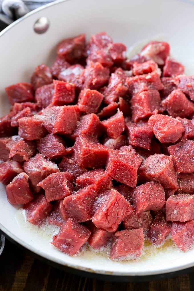 Steak Bites in Garlic Butter Recipe | Garlic Steak | Sirloin Steak Recipe | Steak Appetizer #steak #lowcarb #keto #edsug #dinner Cubes of raw beef seasoned with salt and black pepper.