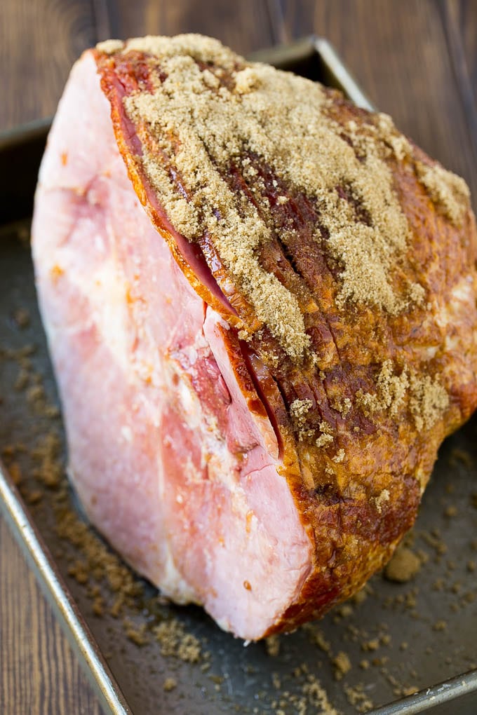 Coca Cola Ham | Coke Glazed Ham | Easter Ham | Christmas Ham | Holiday Ham Recipe #ham #easter #christmas #dinner #edsug A spiral glazed ham coated in brown sugar.