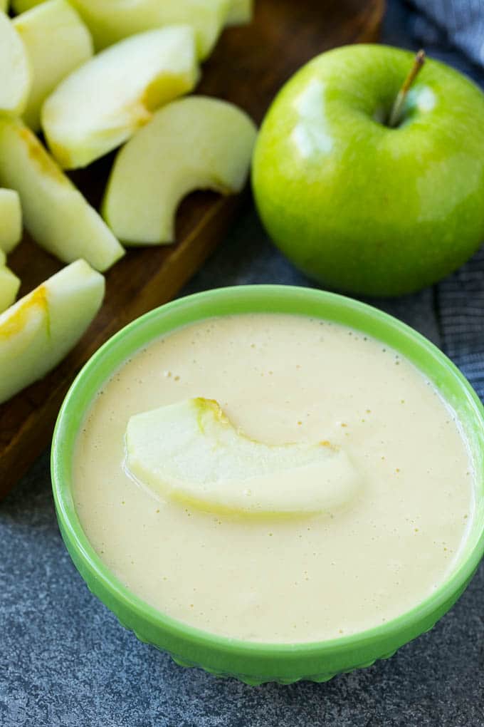 Apple Fries Recipe | Fried Apples Recipe | Cinnamon Sugar Apples | Apple Dessert Recipe #apples #dessert #edsug #fall An apple slice coated in batter.