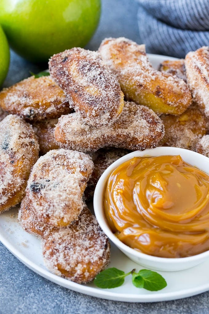Apple Fries Recipe | Fried Apples Recipe | Cinnamon Sugar Apples | Apple Dessert Recipe #apples #dessert #edsug #fall A platter of cinnamon sugar coated apple fries served with caramel dip.