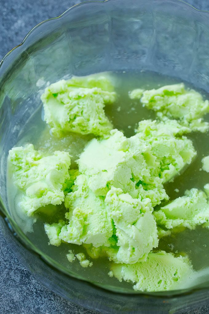 Lime Sherbet Punch | Party Punch Recipe | Sherbet Punch Recipe | Limeade Recipe #sherbet #punch #lime #drink #edsug A bowl with limeade concentrate and sherbet in it.