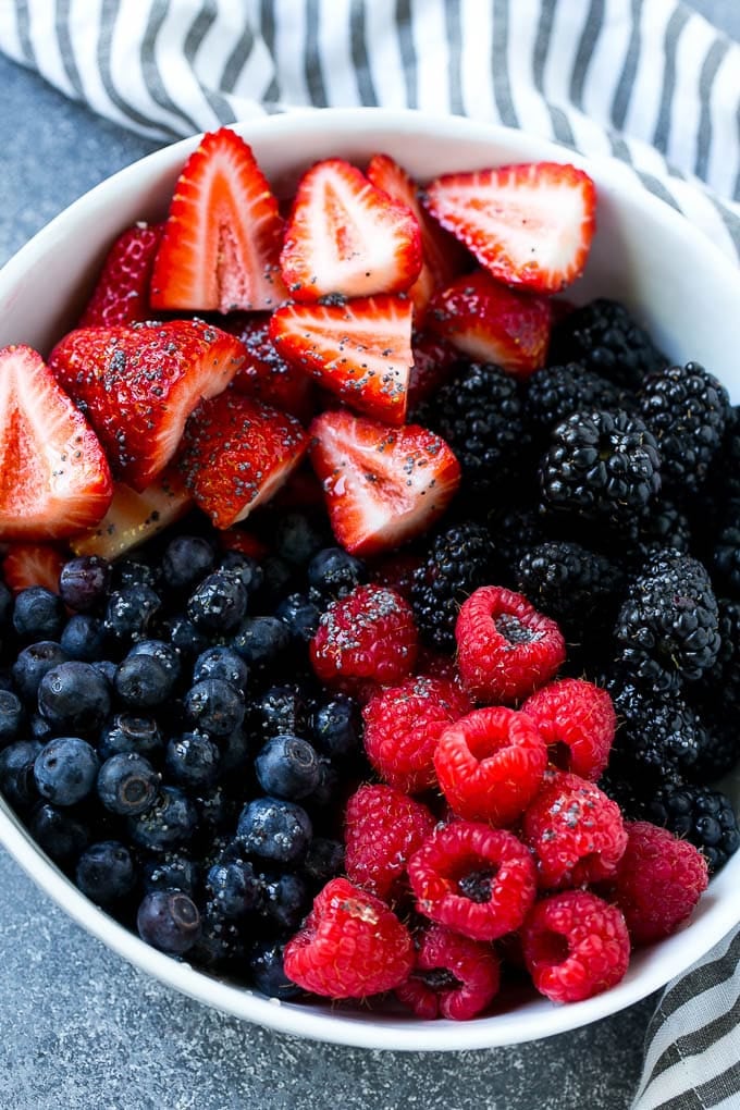 Berry Fruit Salad Recipe | Berry Salad | Summer Berry Salad | Fruit Salad Recipe #berries #fruitsalad #edsug A bowl of blueberries, raspberries, blackberries and strawberries topped with poppy seed dressing.