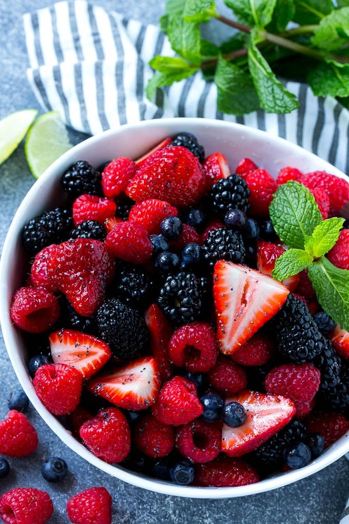 Berry Fruit Salad Recipe | Berry Salad | Summer Berry Salad | Fruit Salad Recipe #berries #fruitsalad #edsug A bowl of berry fruit salad tossed in a honey lime dressing and garnished with fresh mint.