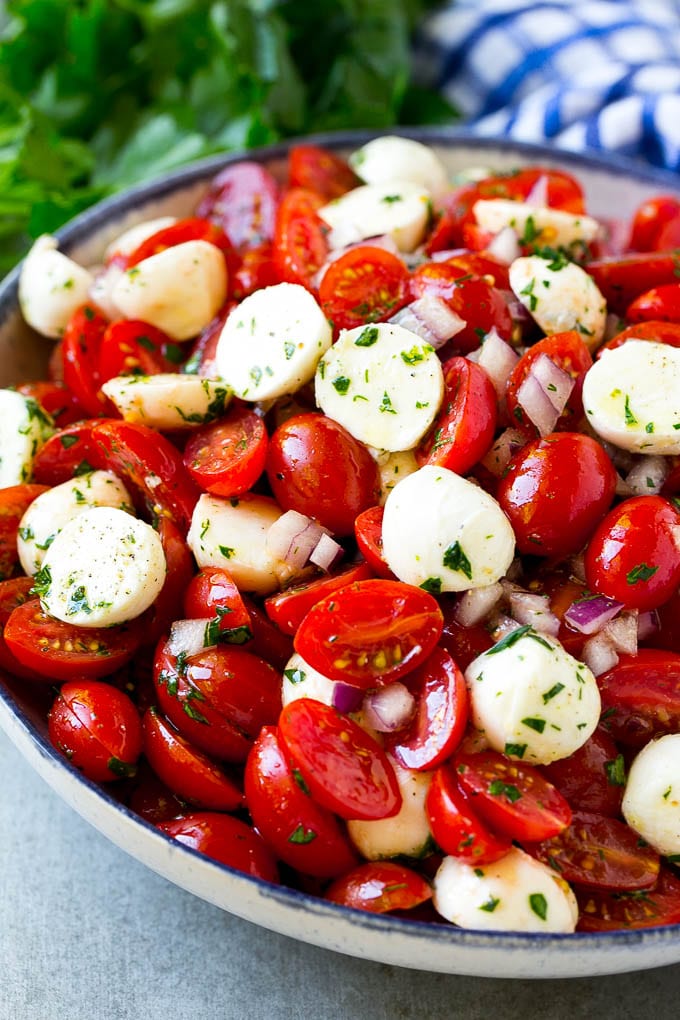 Cherry Tomato Salad Recipe | Tomato Mozzarella Salad | Caprese Salad | Tomato Salad #tomatoes #salad #tomatosalad #caprese #edsug Cherry tomato salad with halved cherry tomatoes, mozzarella balls and red onion, all tossed with herbs and dressing.