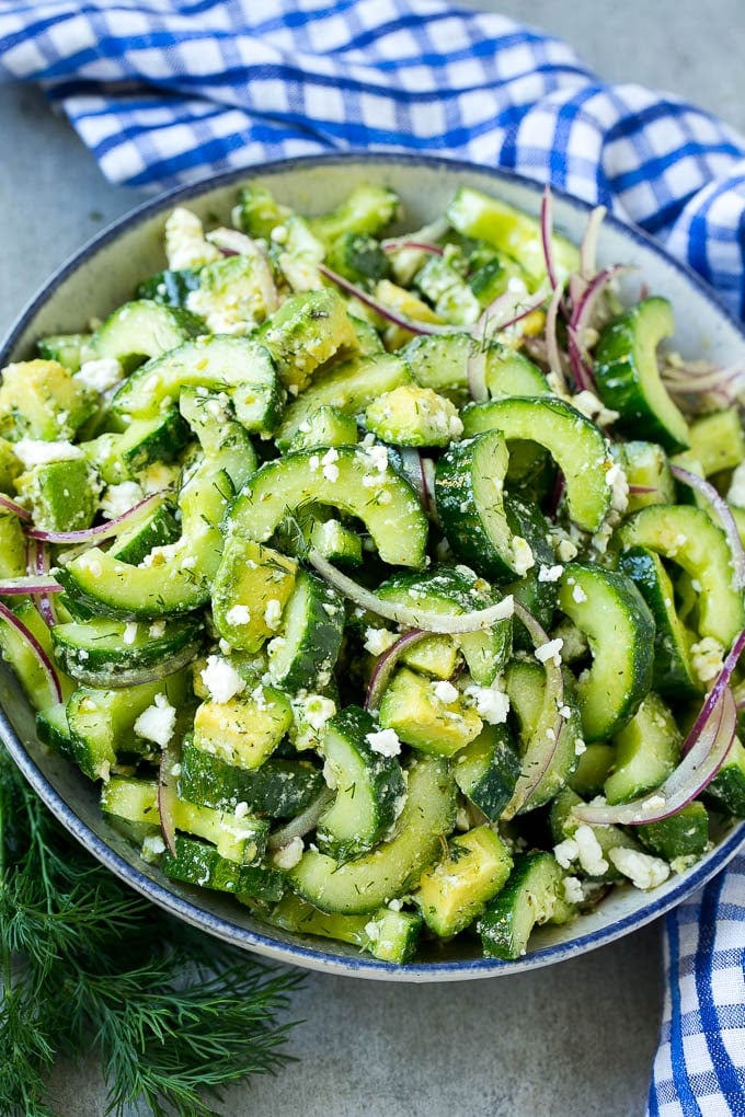 Cucumber Feta Salad Recipe | Cucumber Salad | Feta Cheese Salad | Summer Salad #salad #cucumber #edsug A bowl of cucumber feta salad with avocado.